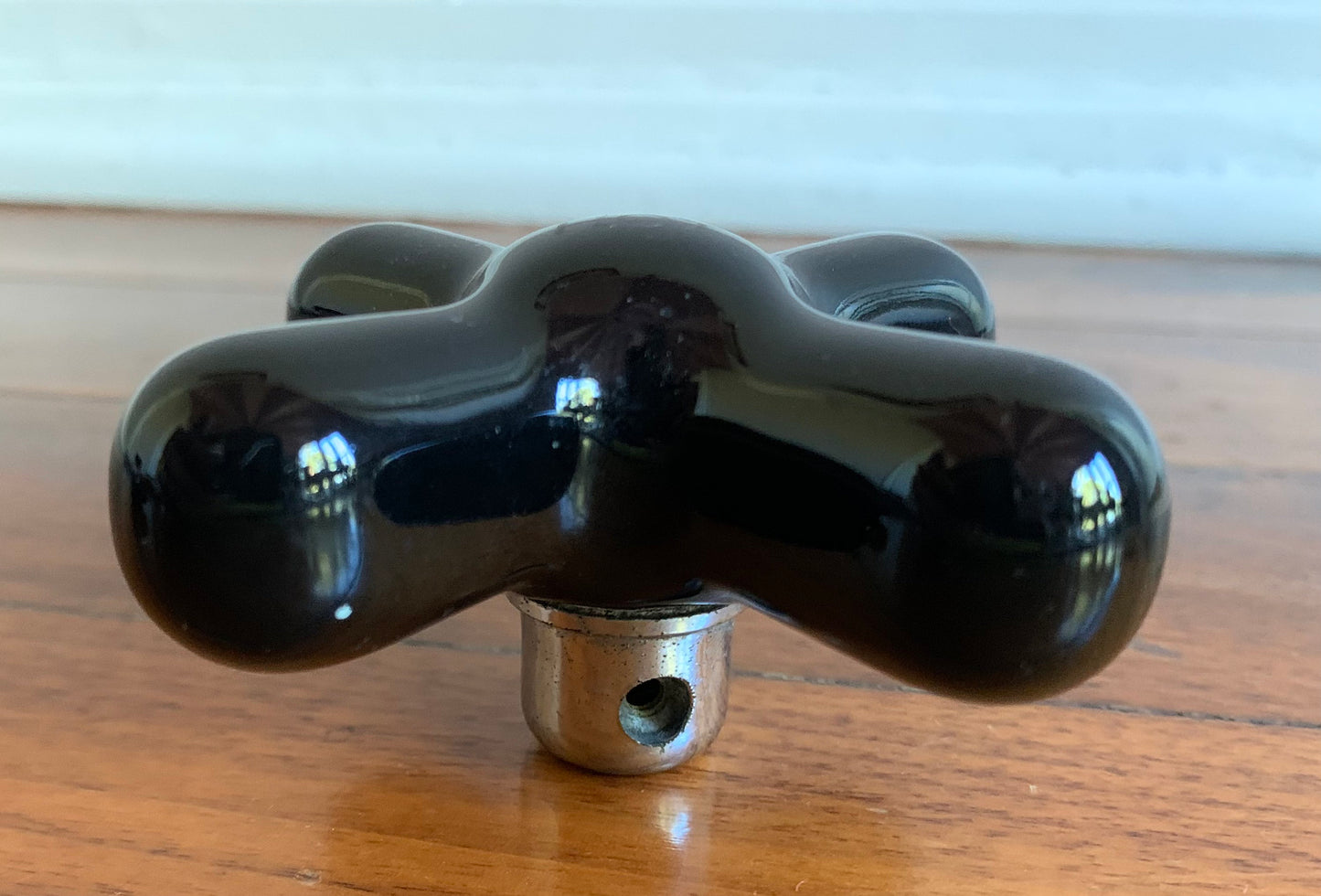 Black art deco faucet hot water handle