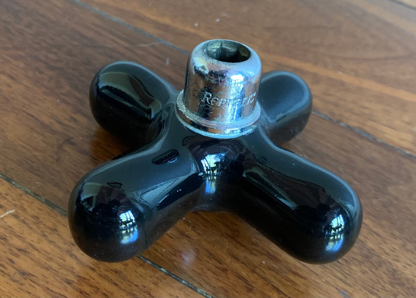 Black art deco faucet hot water handle