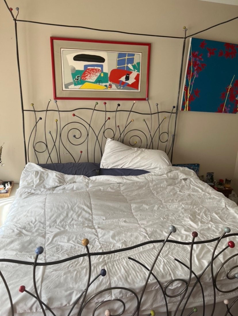Vintage Iron Bed with Whimsical Design